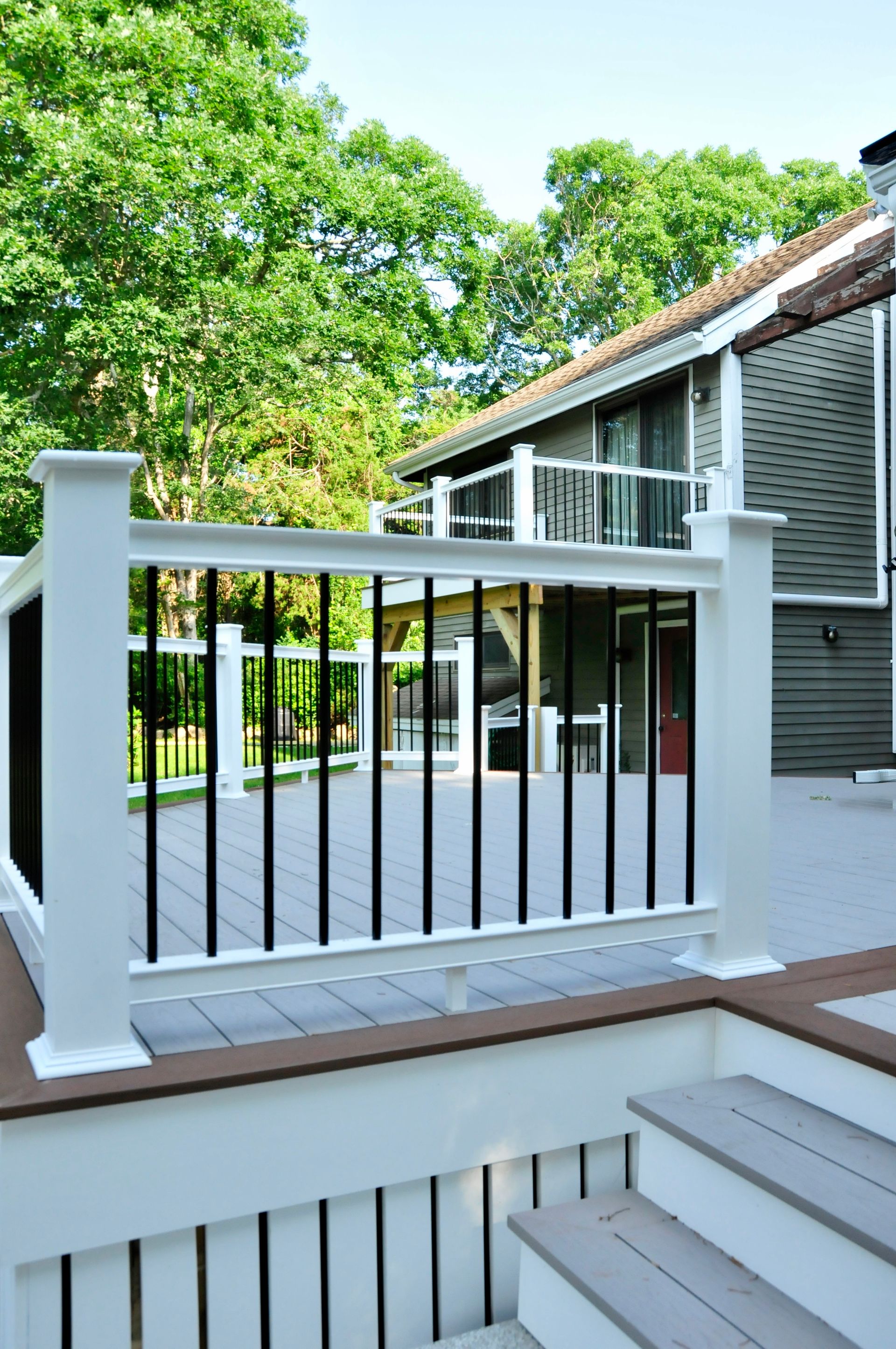 Custom deck and railings on a Cape Cod home